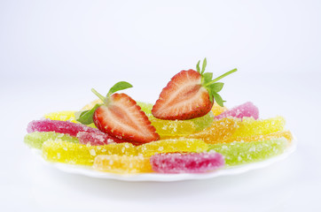 Multicolored marmalade on the plate