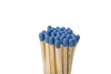 Group of blue matches on white