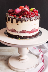 Cream mousse cake with pomegranate.