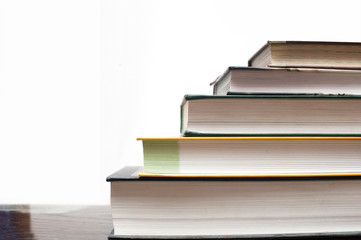 stack of Old books on white background