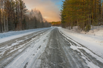 road in winter at dawn