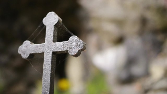 Metal forged crosses in an old cemetery in Europe.