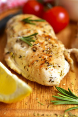 Chicken breast baked with rosemary.
