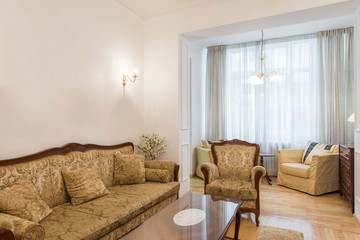 Fototapeta na wymiar Interior of living room with classic style furniture