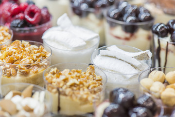 mini ice cream with various colors in the glasses