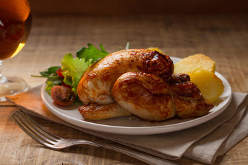 Grilled whole small chicken