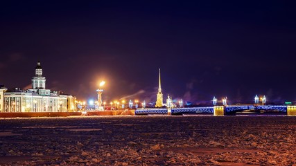 Fototapeta na wymiar Palace bridge at night in Saint-Petersburg in winter