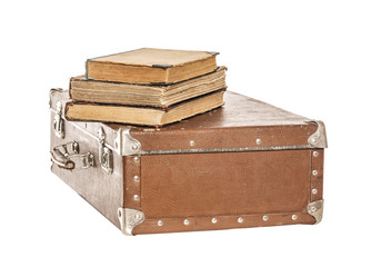 Old books on an old suitcase.