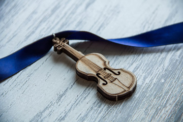 violin on wooden grey background