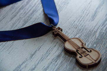 violin on wooden grey background