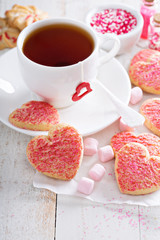 Fototapeta na wymiar Valentines day sugar cookies with sprinkles