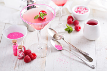 Raspberry martini on white table