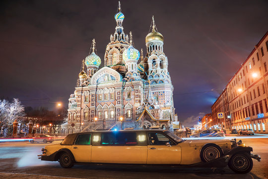 retro car limousine in front of the famous sights of St. Petersb