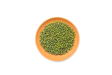 Blue bowl with radish seeds isolated