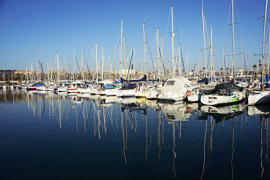 Barcelona, Spain - December 27, 2015: Port Olimpic marina in the city of Barcelona, Catalonia, Spain