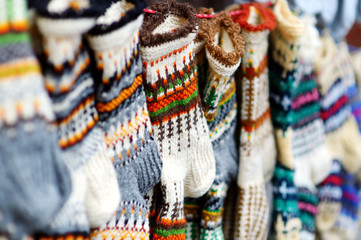 Fototapeta premium Colorful warm knitted socks sold on Easter market in Vilnius