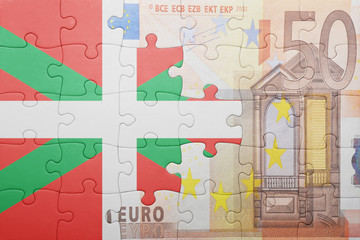 puzzle with the national flag of basque country and euro banknote