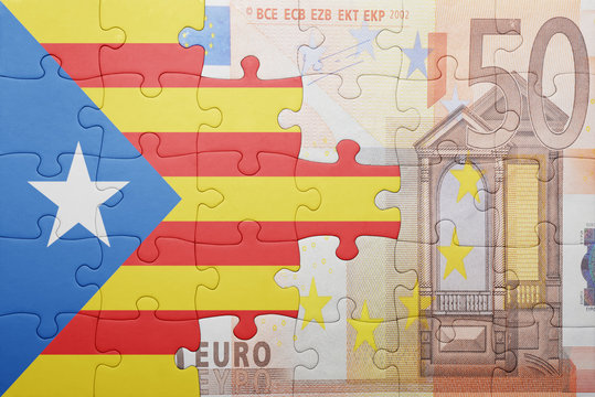 puzzle with the national flag of catalonia and euro banknote