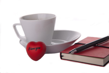 coffee cup, notebook and heart isolated