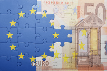 puzzle with the national flag of european union and euro banknote © luzitanija