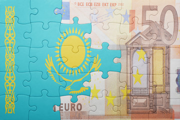 puzzle with the national flag of kazakhstan and euro banknote