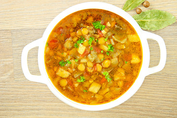 Lentil soup with eggplant, tomatoes and onions