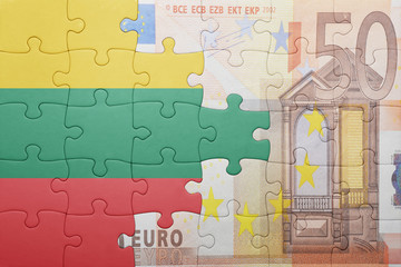 puzzle with the national flag of lithuania and euro banknote