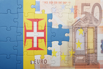 puzzle with the national flag of madeira and euro banknote