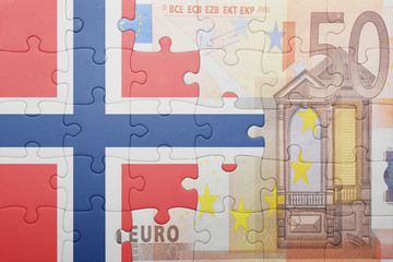 puzzle with the national flag of norway and euro banknote