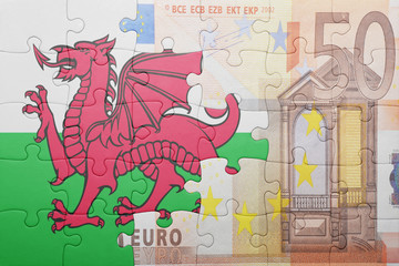 puzzle with the national flag of wales and euro banknote