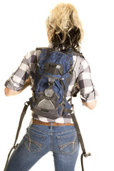 woman with back pack on from the back