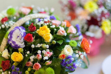 bouquet of colorful flowers in a basket