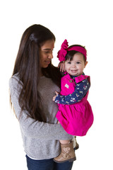 A teenager holding her baby sister