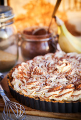 Banoffee pie with whipped cream and chocolate