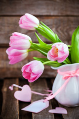 Fresh spring pink tulips with hearts