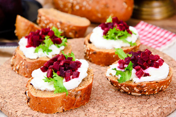 Bruschetta with Goat Cheese, Arugula and Beet, Salt, Pepper, Hon