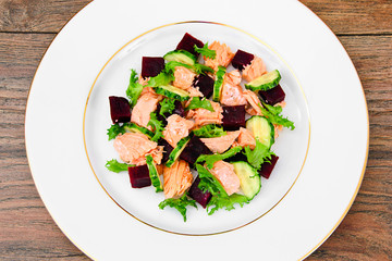 Salad with Beets, Salmon, Cucumber, Arugula, Lemon Zest, Orange,
