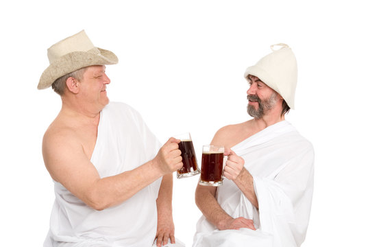 Men in traditional bathing attire drink kvas - Bread drink. From a series of Russian bath.