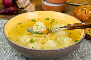 Soup with chicken meatballs and noodles