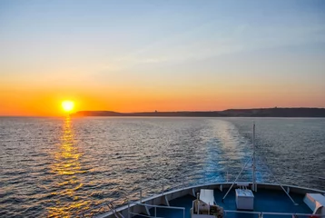 Poster de jardin Mer / coucher de soleil Beautiful sunset from the ship