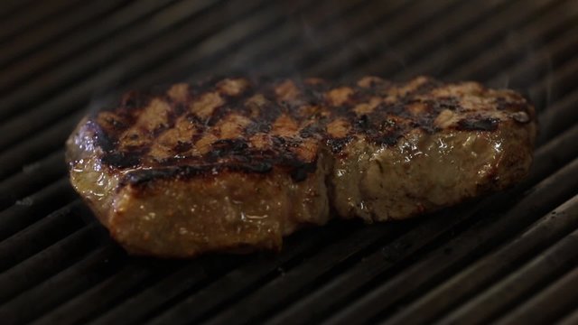 Grilled steak on gas grill medium