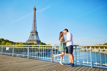 Young romantic couple spending their vacation in Paris