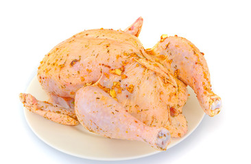 Raw Chicken with Herbs on White Background.
