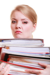 Paperwork. Businesswoman carrying stack of documents