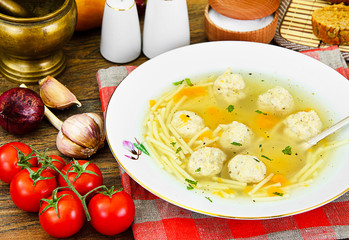 Soup with chicken meatballs and noodles