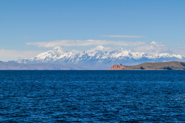 Cordillera Real mountain range behind Titicaca lake, Bolivia. Isla de la Luna also visible.