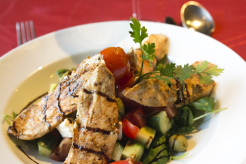 Grilled chicken breast with Greek salad