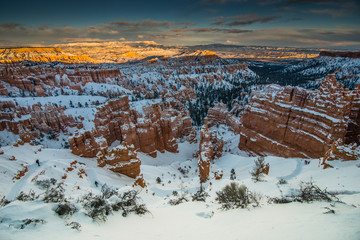 Hoodoos Covered in Winter Snow During Sunset in Bryce Canyon National Park, Utah