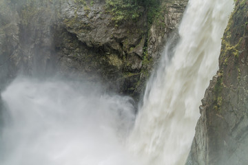 Pailon del Diablo (Devil's Cauldron) waterfall near Banos town, Ecuador