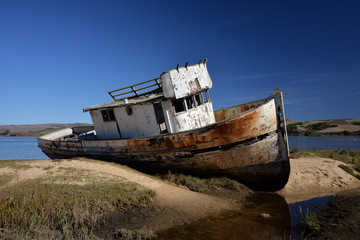 abandoned shipwreck in the bay